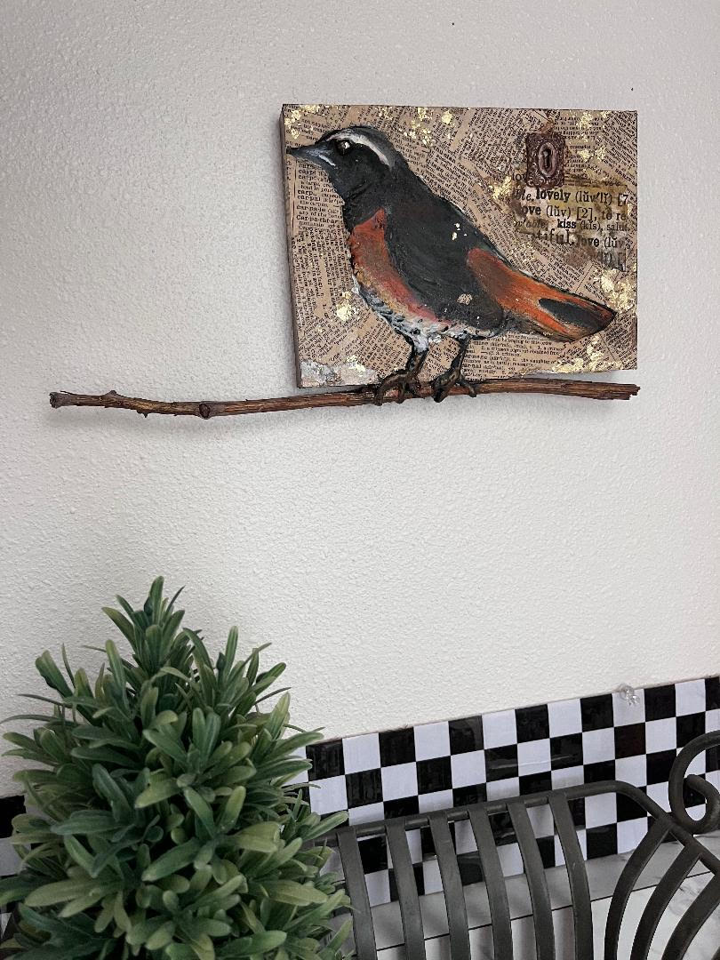 bird art made out of paper clay 